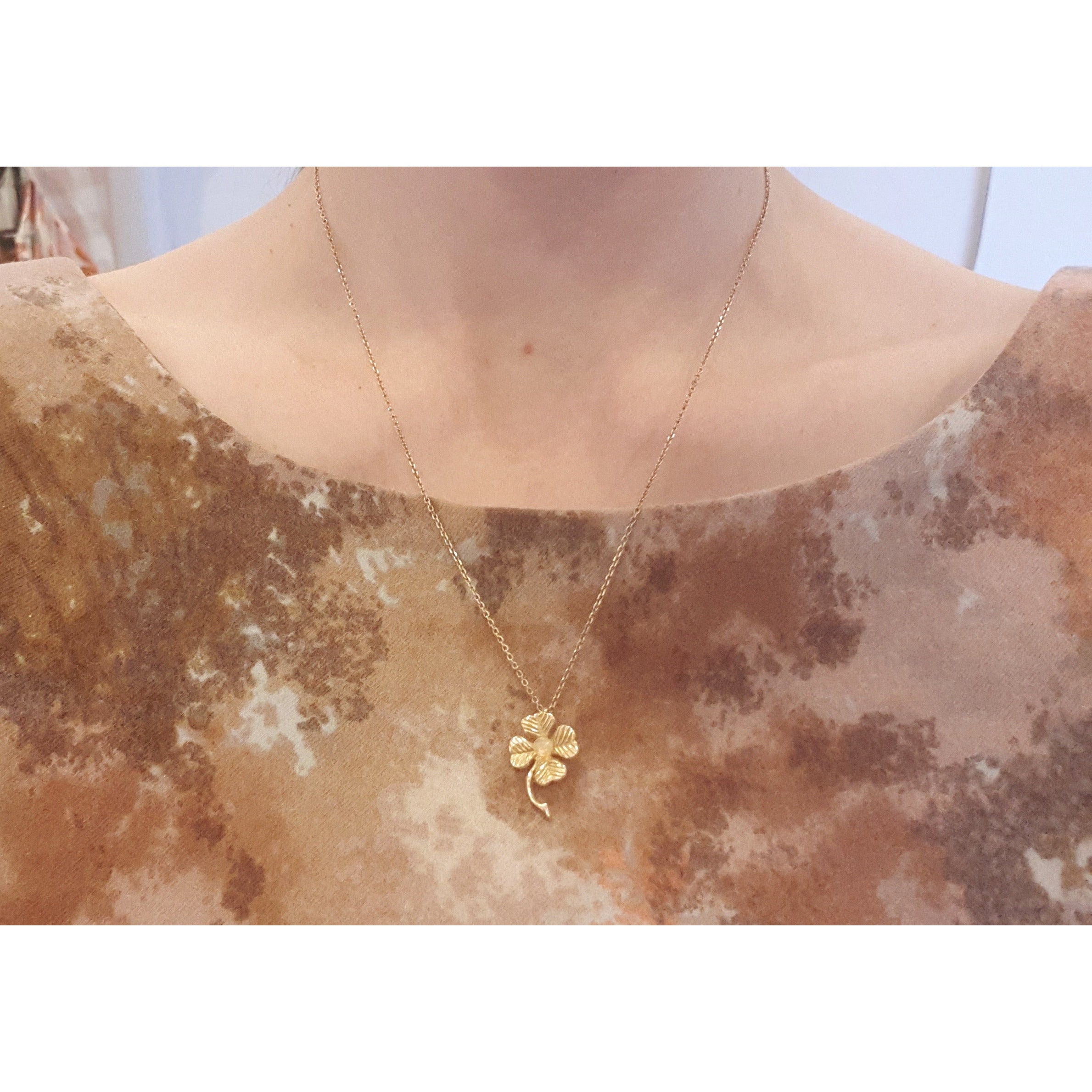 Gold four store leaf clover necklace