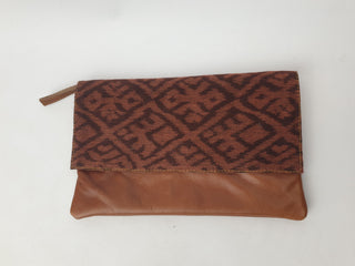 Little Traveller brown leather clutch with front fabric detail Little Traveller preloved second hand clothes 1