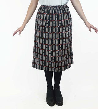 Frock Me Out black domino print skirt size S Frock Me Out preloved second hand clothes 1