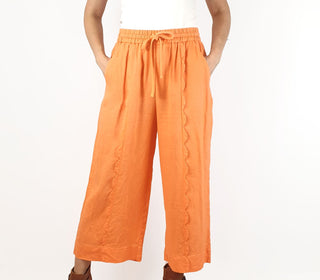 Jericho Road peachy orange wide leg pants with fun scalloping detail size 10 Jericho Road preloved second hand clothes 1