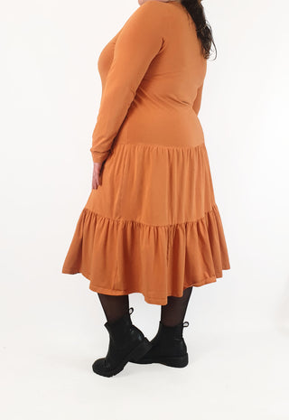 Orange long sleeve tiered dress best fits size 20