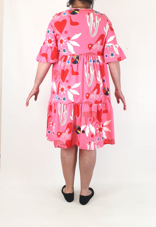 Stunning pink half sleeve dress with unique print, fits size 16-18