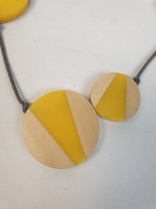 Wooden and yellow necklace with grey twine