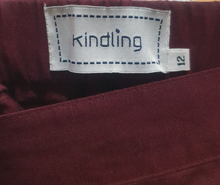 Kindling red skirt size 12, best fits 10