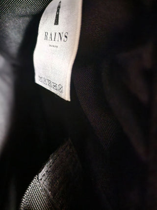 Rains black backpack / rucksack