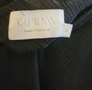 Kuwaii black ribbed skirt size 8 (large fit, best suits 10)