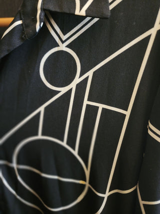Olga De Polga black and white dress best fits size 12
